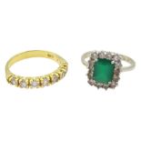 18ct gold eight stone cubic zirconia half eternity ring and a white gold green and clear paste stone