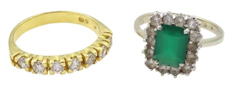 18ct gold eight stone cubic zirconia half eternity ring and a white gold green and clear paste stone