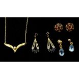 18ct gold single stone diamond wishbone necklace and three pairs of 9ct gold stud earrings including