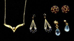 18ct gold single stone diamond wishbone necklace and three pairs of 9ct gold stud earrings including