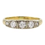 Gold five stone graduating round brilliant cut diamond ring