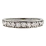 Platinum channel set round brilliant cut diamond half eternity ring