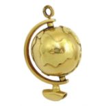 18ct gold spinning globe pendant/charm