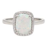 Silver rectangular opal and cubic zirconia cluster ring