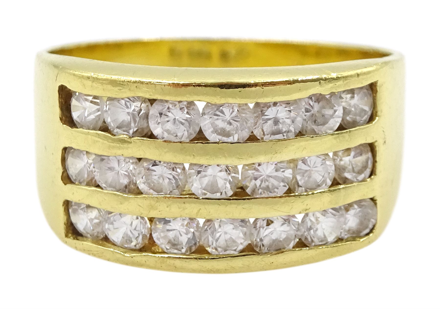 18ct gold three row channel set cubic zirconia ring