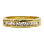 18ct gold channel set nine stone round brilliant cut diamond ring