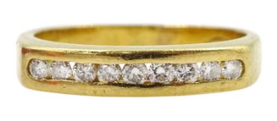 18ct gold channel set nine stone round brilliant cut diamond ring