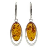 Pair of silver oval amber pendant earrings