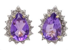 Pair of 9ct gold pear shaped amethyst and diamond stud earrings