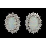 Pair of silver opal and cubic zirconia stud earrings