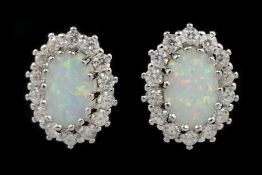 Pair of silver opal and cubic zirconia stud earrings