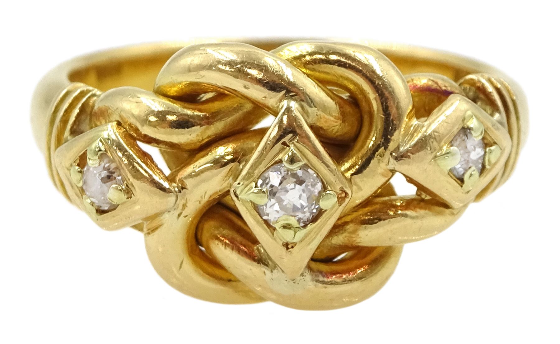 Edwardian 18ct gold three stone old cut diamond love knot ring