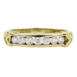 9ct gold channel set seven stone round brilliant cut diamond ring with chevron decoration