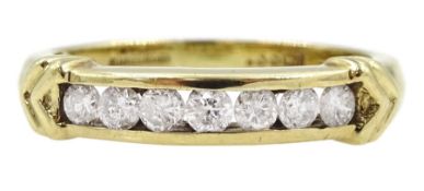 9ct gold channel set seven stone round brilliant cut diamond ring with chevron decoration