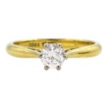 Gold single stone round brilliant cut diamond ring