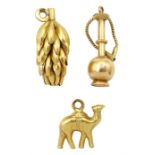 Two 18ct gold banana and camel pendant/charms and a 14ct gold shisha pipe pendant/charm