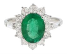 18ct white gold oval emerald and round brilliant cut diamond cluster ring