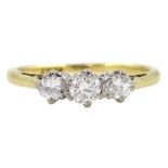 Gold three stone round brilliant cut diamond ring