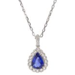 18ct white gold pear shaped sapphire and milgrain set round brilliant cut diamond pendant necklace