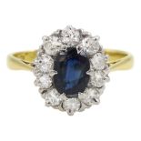 18ct gold oval sapphire and round brilliant cut diamond cluster ring