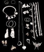 Collection of silver jewellery including moon and star bracelet