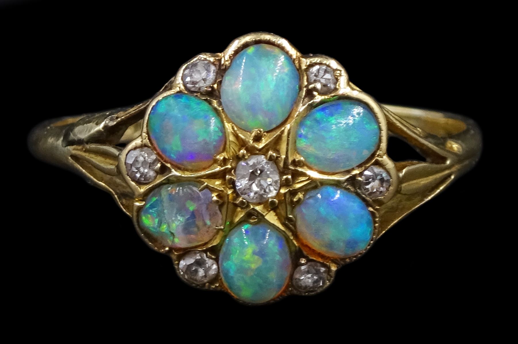 Early 20th century oval opal and diamond flower head cluster ring