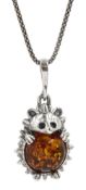 Silver Baltic amber hedgehog pendant necklace