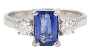 18ct white gold emerald cut sapphire and round brilliant cut diamond ring