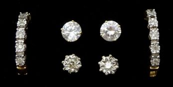 Pair of 18ct white gold illusion set single stone diamond stud earrings