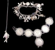 Silver jewellery including charm bracelet with twenty six charms including guitar