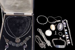 Collection of silver jewellery including filigree flower pendant necklace with matching pair of clip