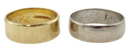 White gold wedding band and a yellow gold wedding band