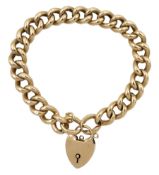 Gold curb link bracelet with heart padlock clasp