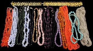 Collection of seventeen gemstone bead necklaces including coral