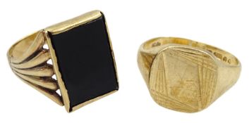 Gold gentleman's black onyx signet ring and one other signet ring