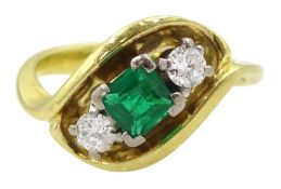 18ct gold three stone square cut emerald and round brilliant cut diamond cross over ring