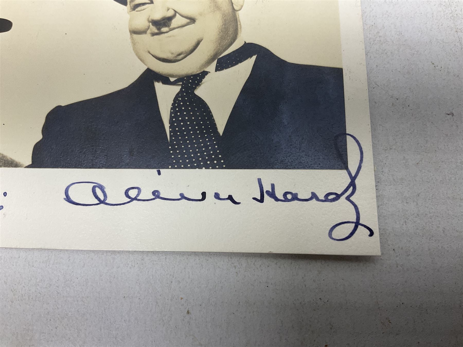 Stan Laurel and Oliver Hardy signatures on head and shoulder portrait of the two comedians inscribed - Image 3 of 5