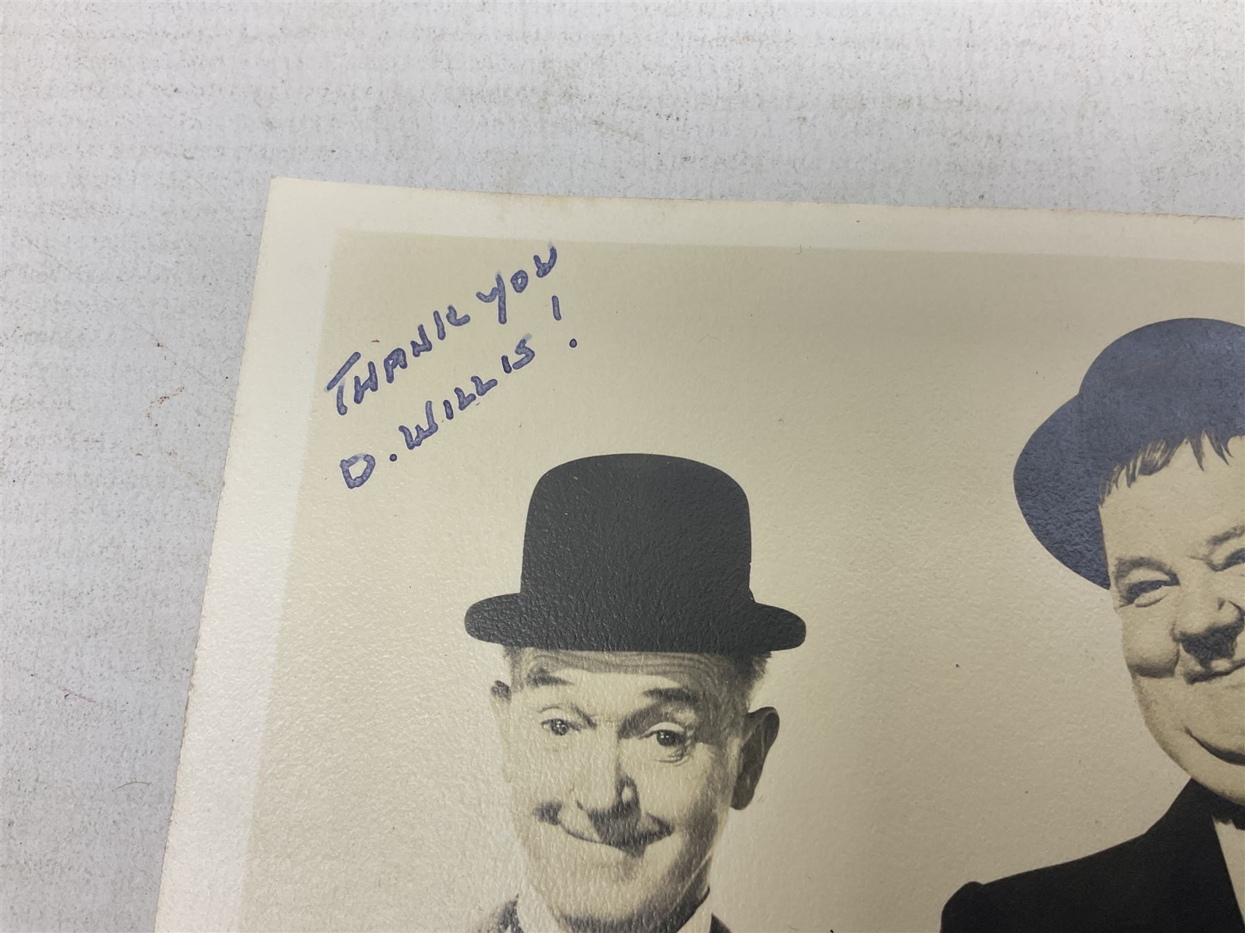 Stan Laurel and Oliver Hardy signatures on head and shoulder portrait of the two comedians inscribed - Image 4 of 5