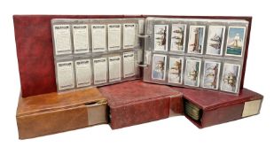 Four modern loose leaf albums containing a large quantity of cigarette and trade cards by Stephen Mi