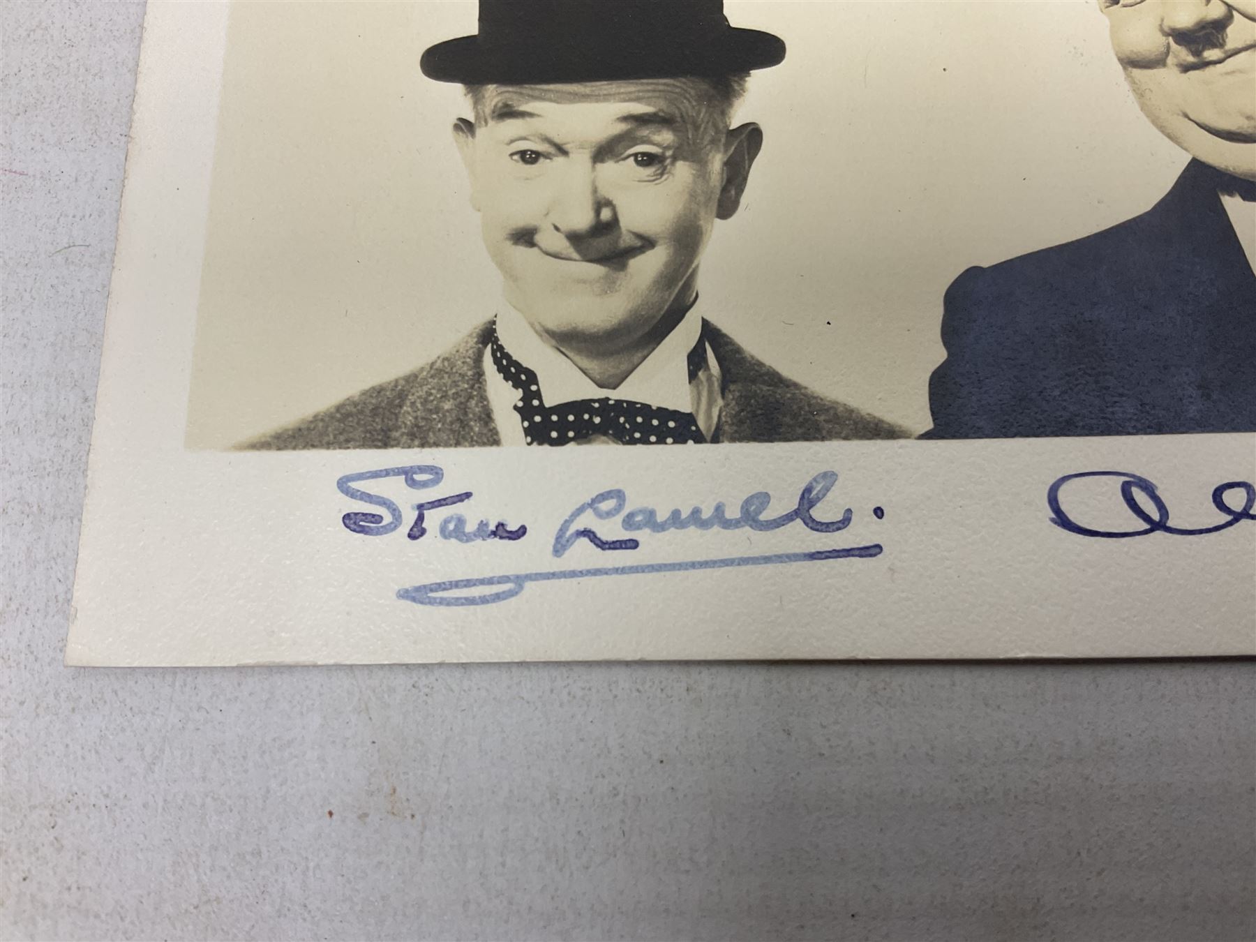 Stan Laurel and Oliver Hardy signatures on head and shoulder portrait of the two comedians inscribed - Image 2 of 5
