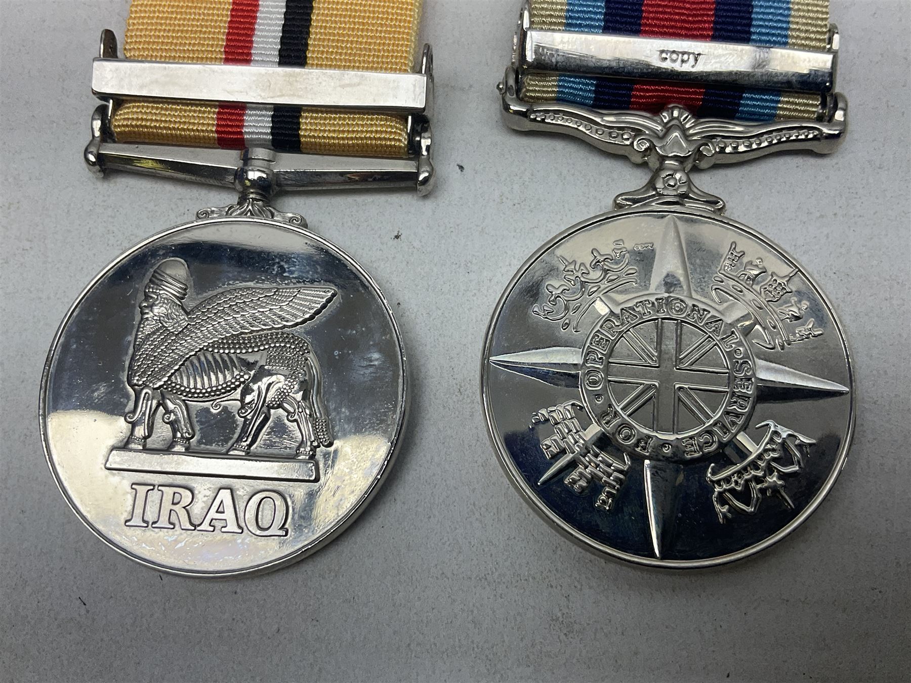 NATO Service Medal with clasp for Former Yugoslavia; together with three copy medals - Iraq Medal wi - Image 9 of 11