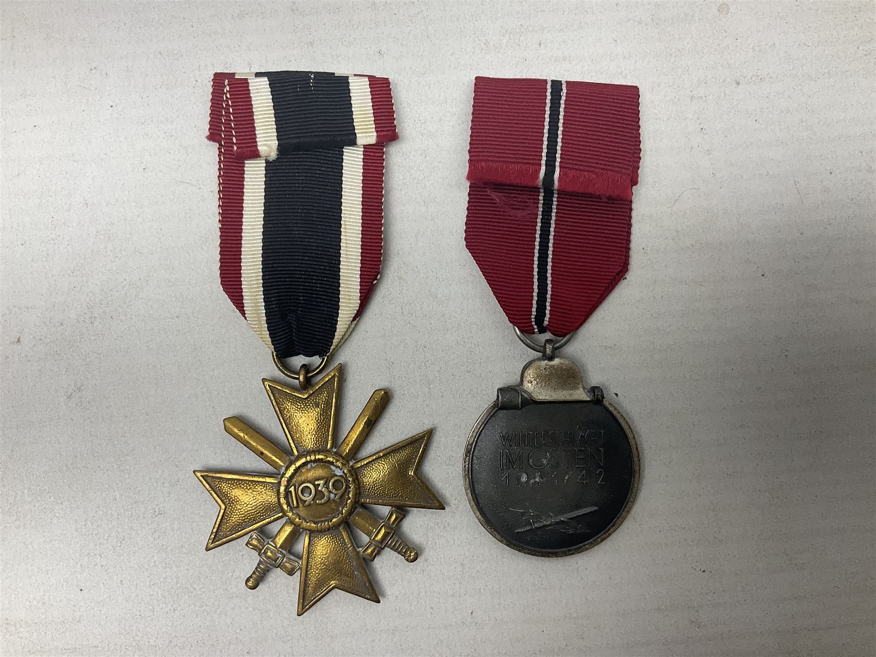 Two WW2 German medals - Winter Campaign in Russia 1941-42 and War merit Cross with swords; both with - Image 4 of 8