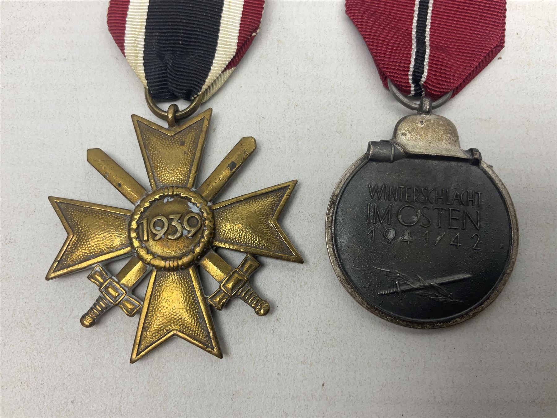 Two WW2 German medals - Winter Campaign in Russia 1941-42 and War merit Cross with swords; both with - Image 5 of 8