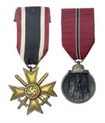 Two WW2 German medals - Winter Campaign in Russia 1941-42 and War merit Cross with swords; both with