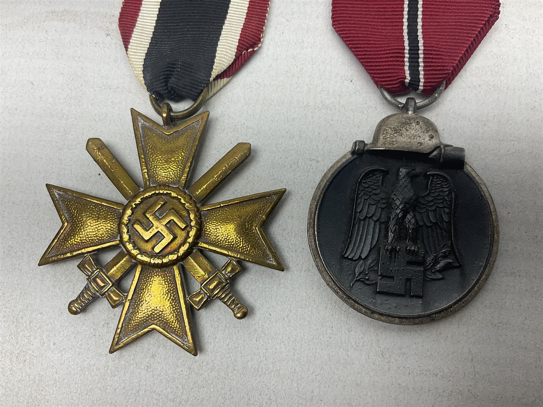 Two WW2 German medals - Winter Campaign in Russia 1941-42 and War merit Cross with swords; both with - Image 2 of 8