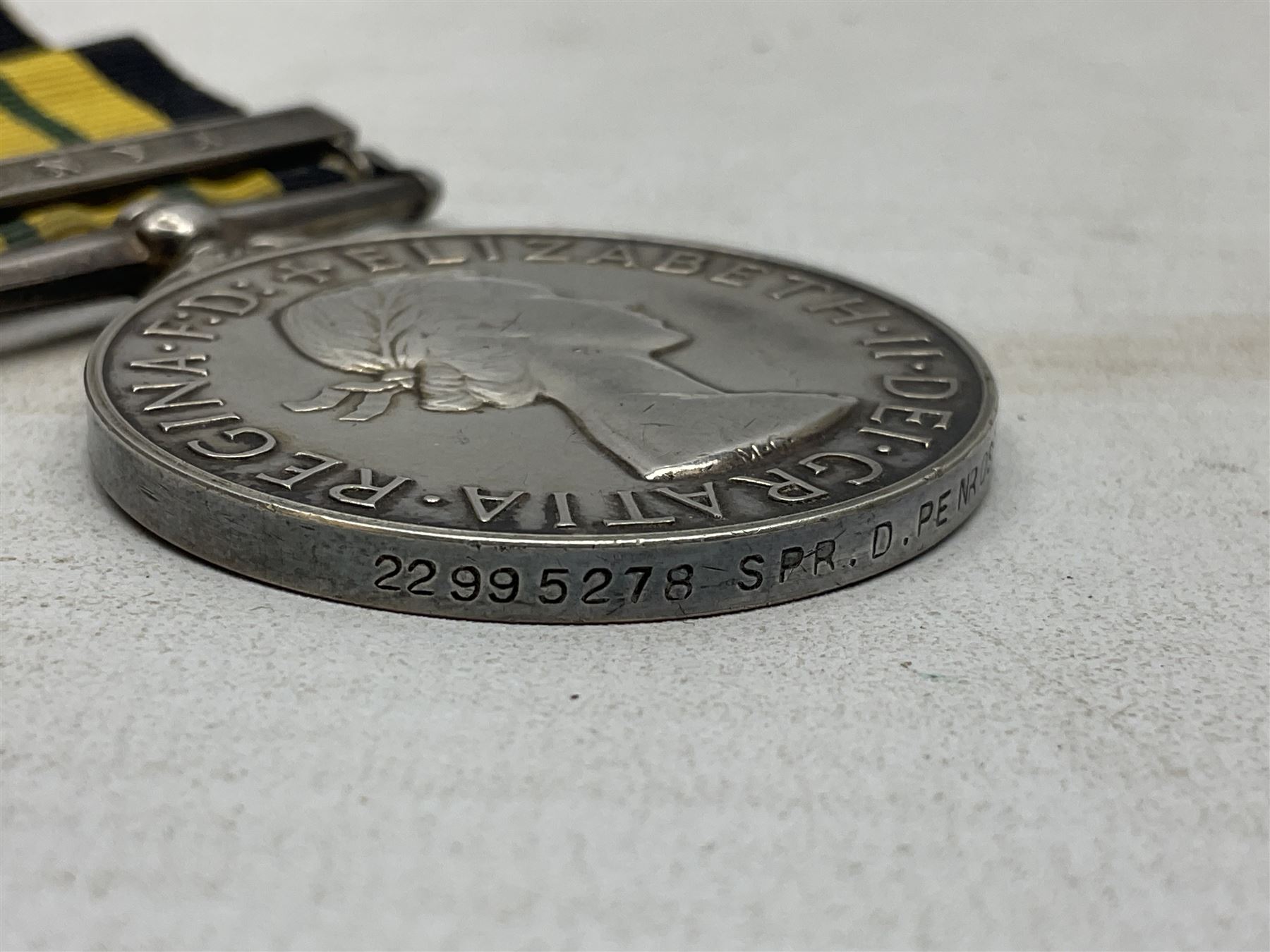 Elizabeth II Africa General Service Medal with Kenya clasp awarded to 22995278 Spr. D. Penrose R.E.; - Image 4 of 7