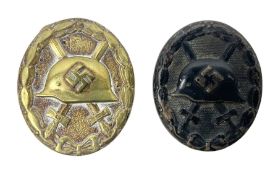 Two WW2 German wound badges - gilt grade and black grade (2)