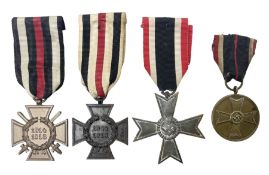 Four WW2 German medals - Cross of Honour with swords (combatants); Cross of Honour without swords (n