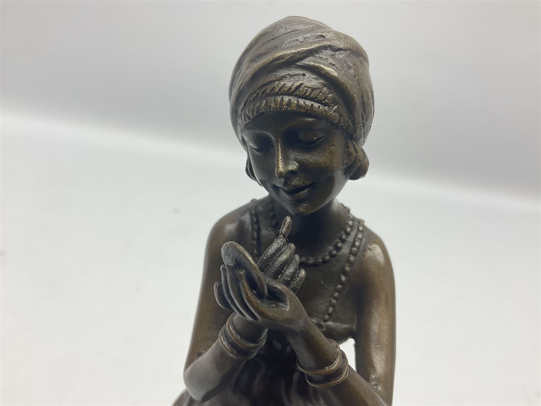 Art Deco style bronze figure of a lady seated on a stool applying lipstick - Image 5 of 7