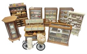 Collection of dolls house bakery and cake shop furniture and produce